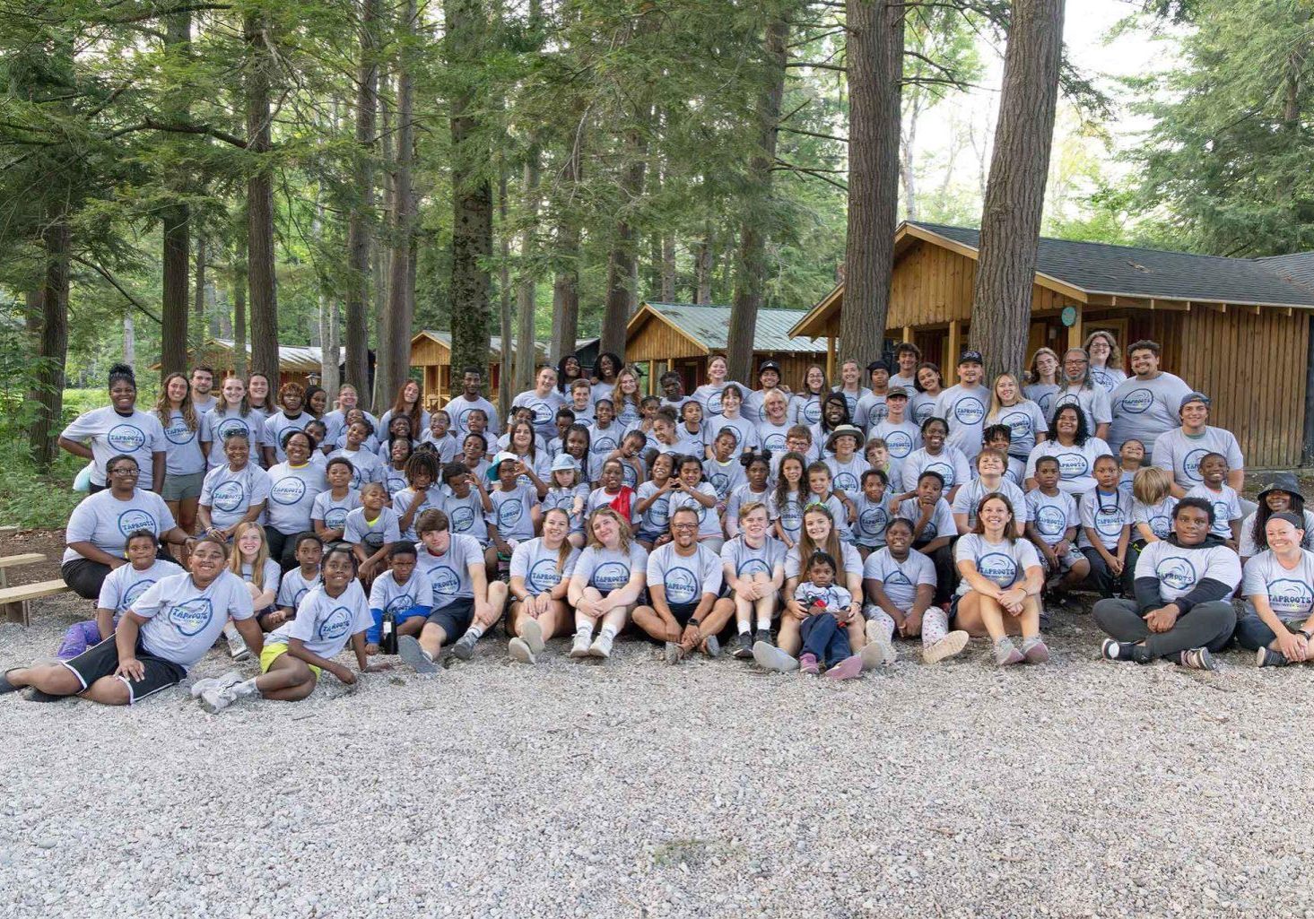A large group of campers poses for a photo.